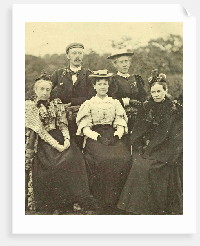 Group portrait of four women and one man around a table in the open air by Anonymous