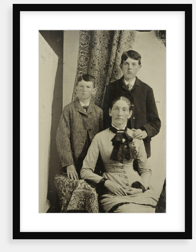 Portrait of a woman and two boys by Anonymous