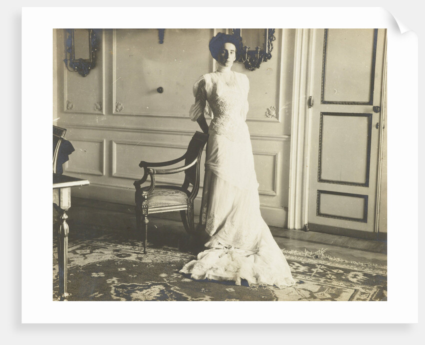 Unidentified woman standing in an interior by Anonymous