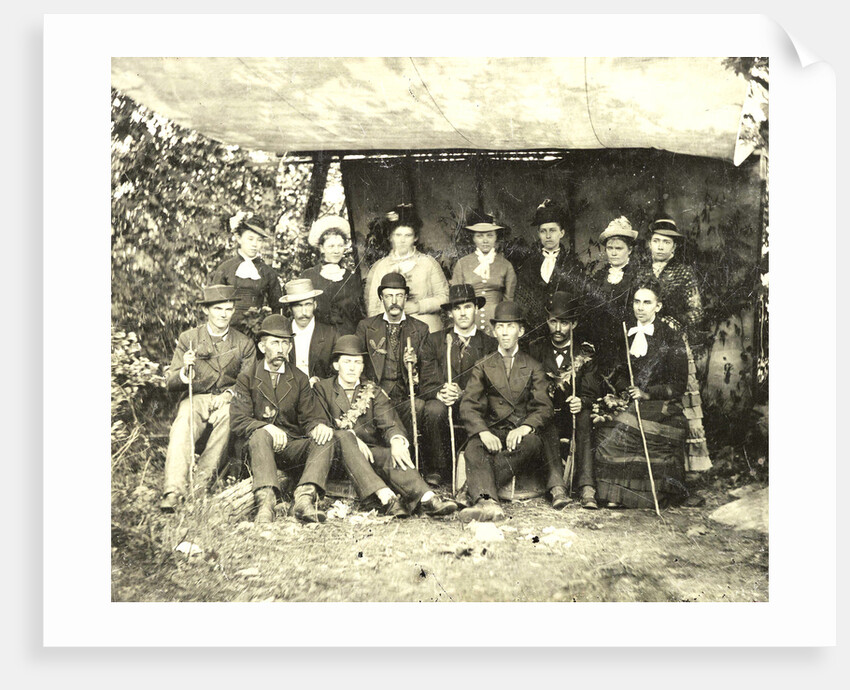 Group portrait of hikers in a makeshift studio by Anonymous