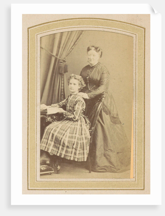 Portrait of a girl in a dress with tartan and a woman in a dress at a table with books by Anonymous