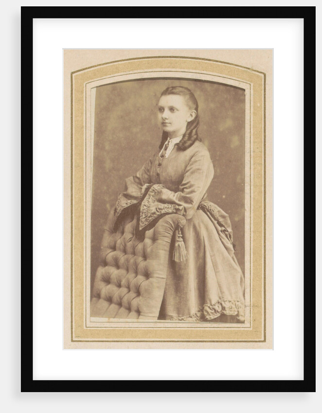 Portrait of a Young Woman in a dress leaning on a chair by De Lavieter & Co.