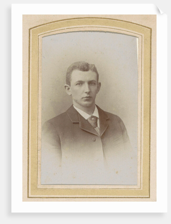 Portrait of a man wearing a coat and tie by J.C. Reesinck