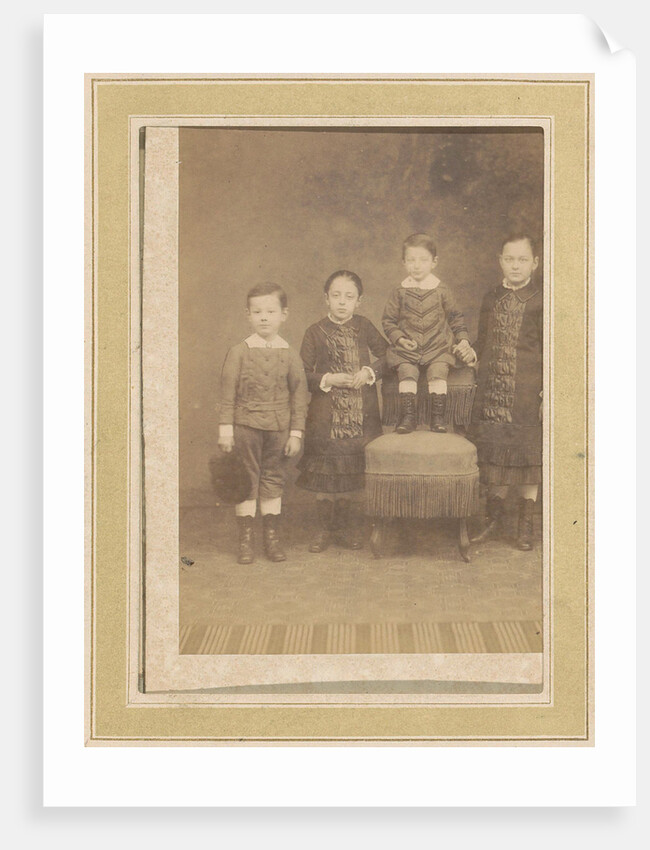 Portrait of four children in a chair by Anonymous