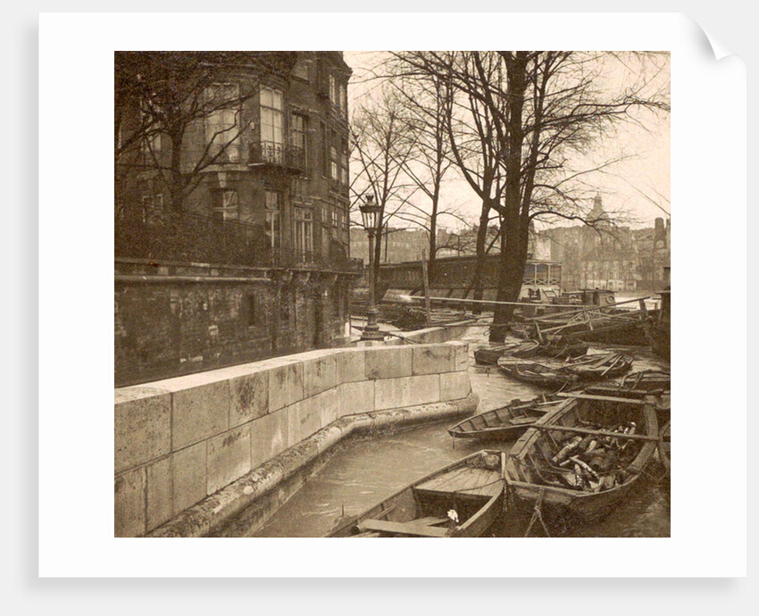 Boats along a quay during the flooding of Paris, France by Anonymous