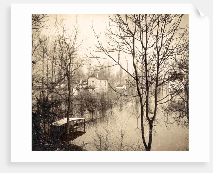 house flooded suburb of Paris seen through bare trees, France by Anonymous