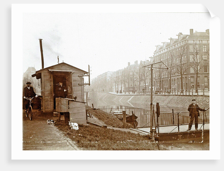 Men, presumably workers, and two cats at a jetty and a guardhouse along a canal by Anonymous
