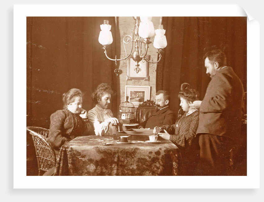 Men and women playing a board game in a living room by Anonymous