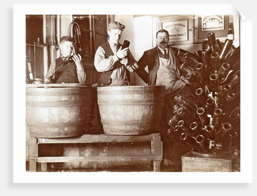 Brouwer and attendants cleaning bottles at a bottle drying rack by Anonymous