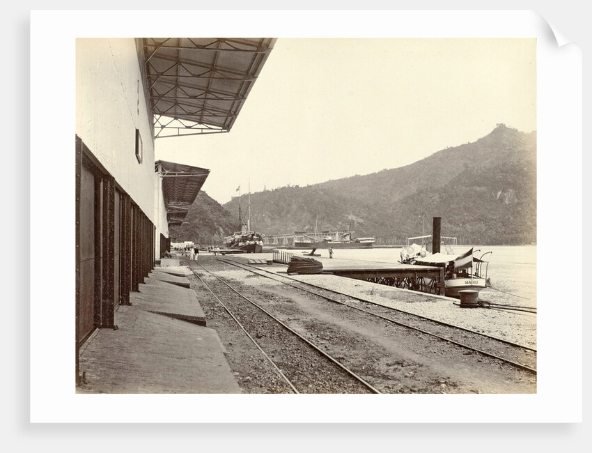 Quay with railway tracks and boats in the Emmahaven Padang by Anonymous