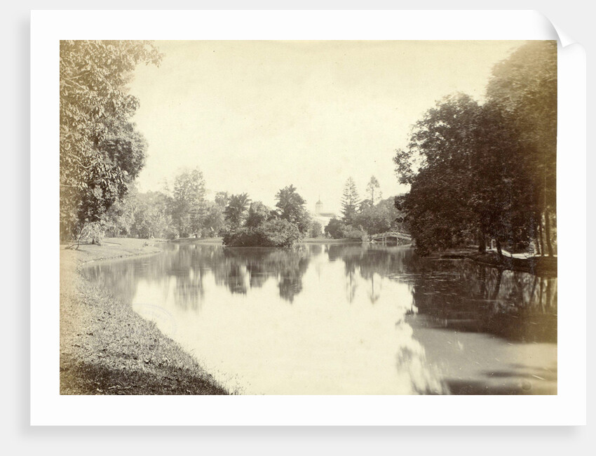 Water in the Dutch East Indies at the end with a bridge and a church tower by Anonymous
