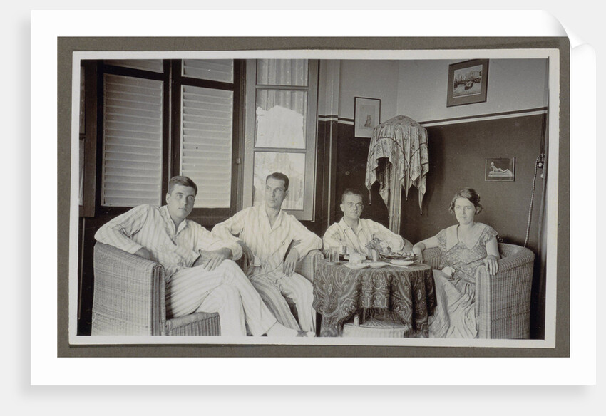 Three men and a woman around a table by Anonymous