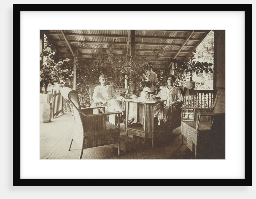 Portrait of a young couple on a porch in the Dutch East Indies, indonesia by Anonymous