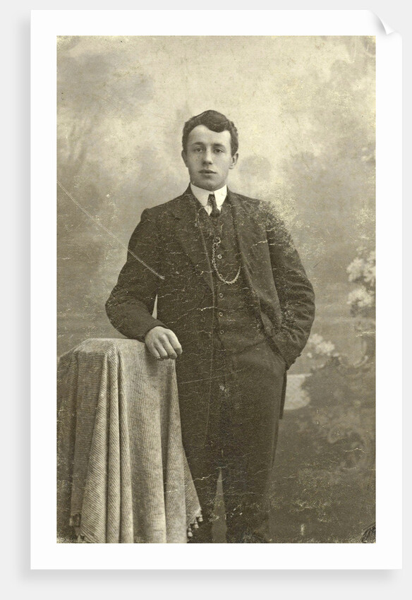 Studio Portrait of a young man standing by Jacobus Vetter