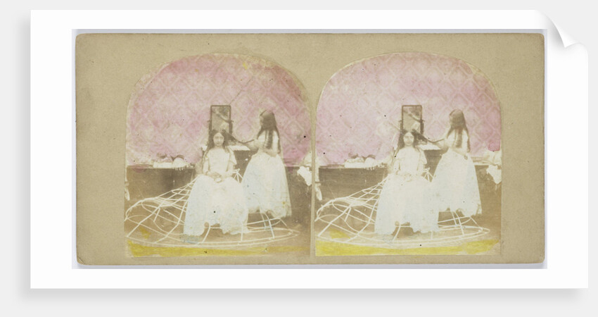 Scene in boudoir: girl combs hair of another girl in crinoline by Anonymous