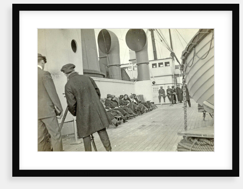 Aboard ship to New York in World War I, filmmaker among the guests on deck filming by Anonymous