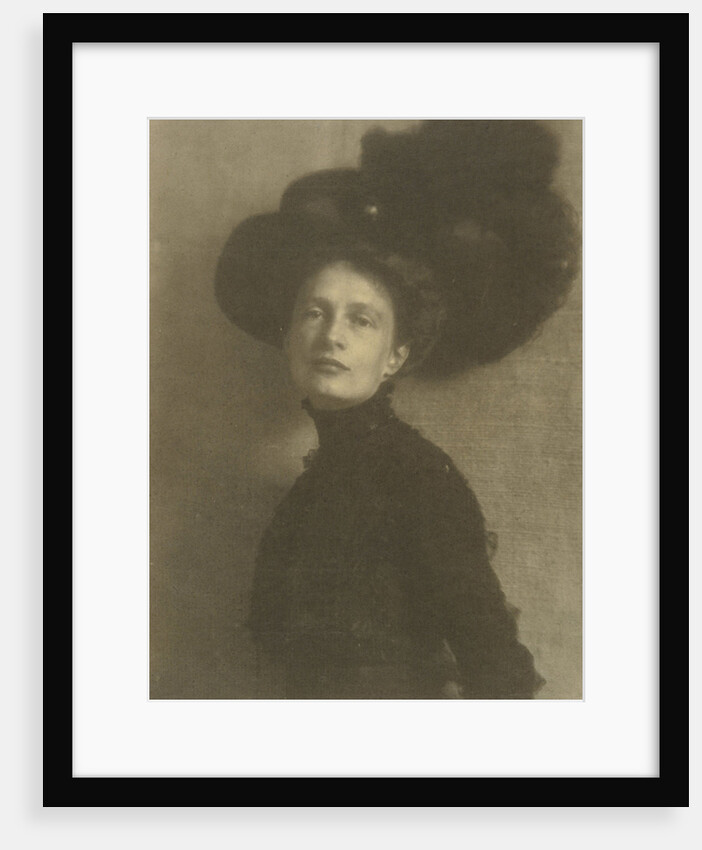 Portrait of a woman with feather hat by Heinrich Kühn