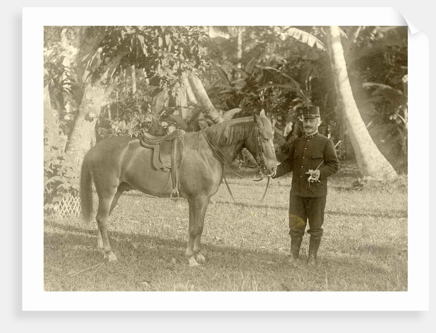Portrait of a soldier with horse in the Dutch East Indies, Indonesia by Anonymous