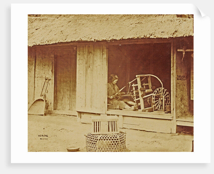 Woman at a loom in a barn by Anonymous