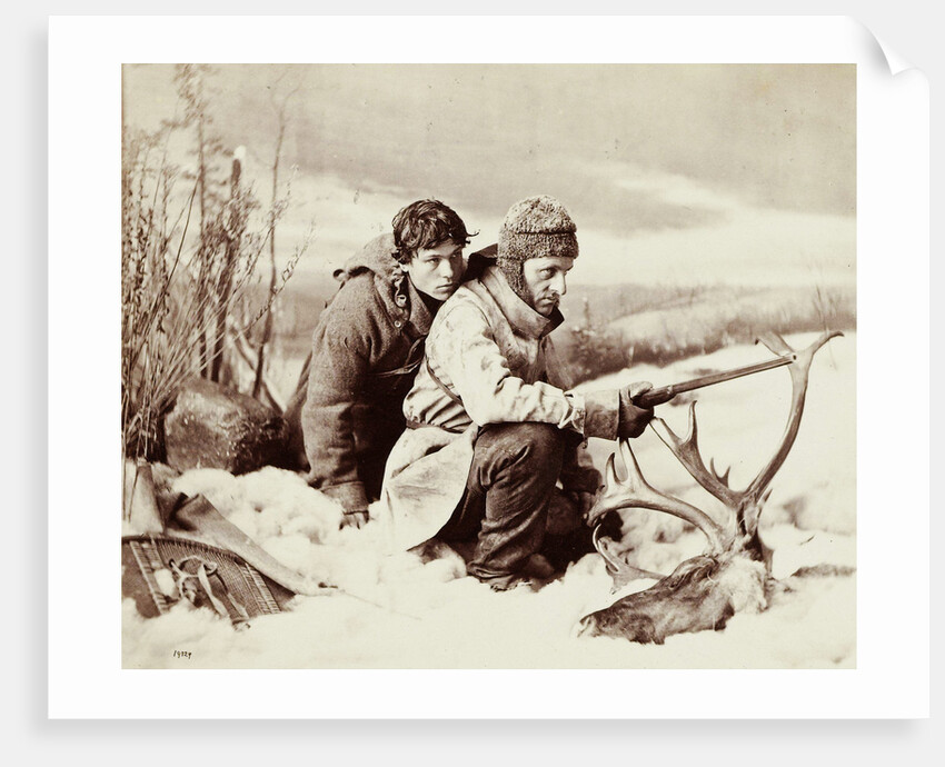 Two hunters in the snow in front of them a moose head by William Notman