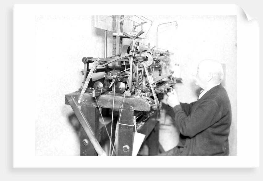 Philadelphia, Pennsylvania - Hosiery. Minnesac Mills. Man working at machine., May 1937 by Lewis Hine