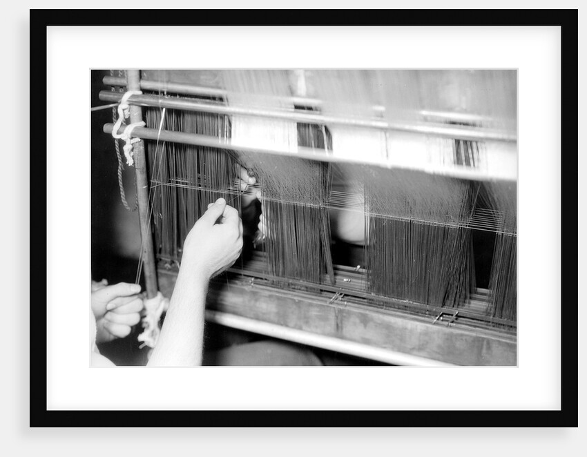 Paterson, New Jersey - Textiles. Wishnack Silk Company. Picture of a warp being entered. by Lewis Hine