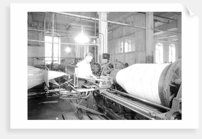 Paterson, New Jersey - Textiles. Jackson Winding and Warping Company - Picture of a high speed warper, June 1937 by Lewis Hine