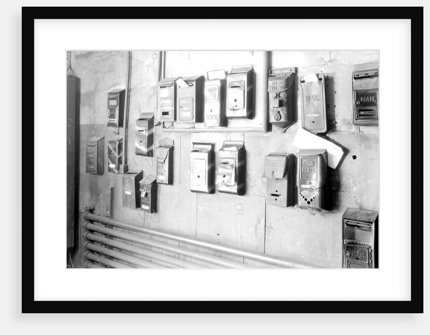 Paterson, New Jersey - Textiles. Numerous mail boxes indicate numerous tenants in the mill building, 185 Sixth Avenue, June 1937 by Lewis Hine