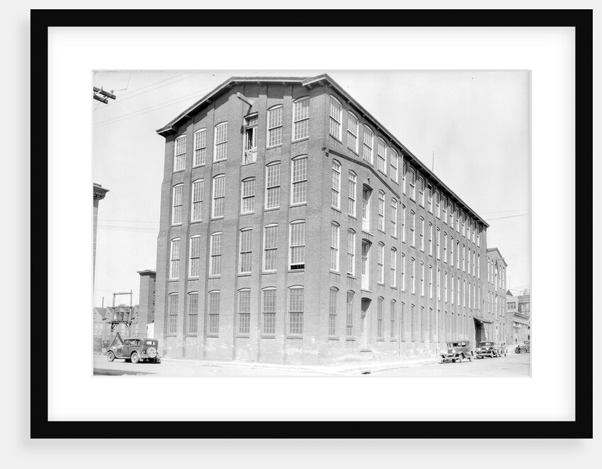 Paterson, New Jersey - Textiles. Mill at 185 Sixth Avenue which houses a number of family shops, June 1937 by Lewis Hine