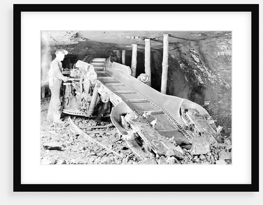 Man operating mining equipment, 1936 by Lewis Hine