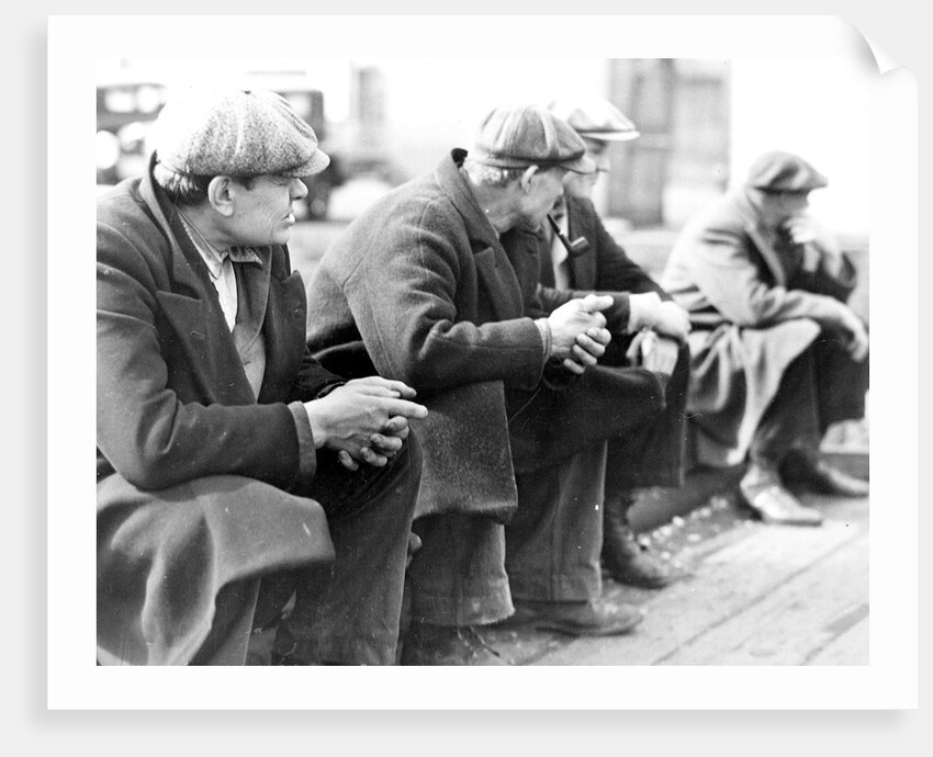 Row of men at the New York City docks out of work during the depression, 1934 by Lewis Hine