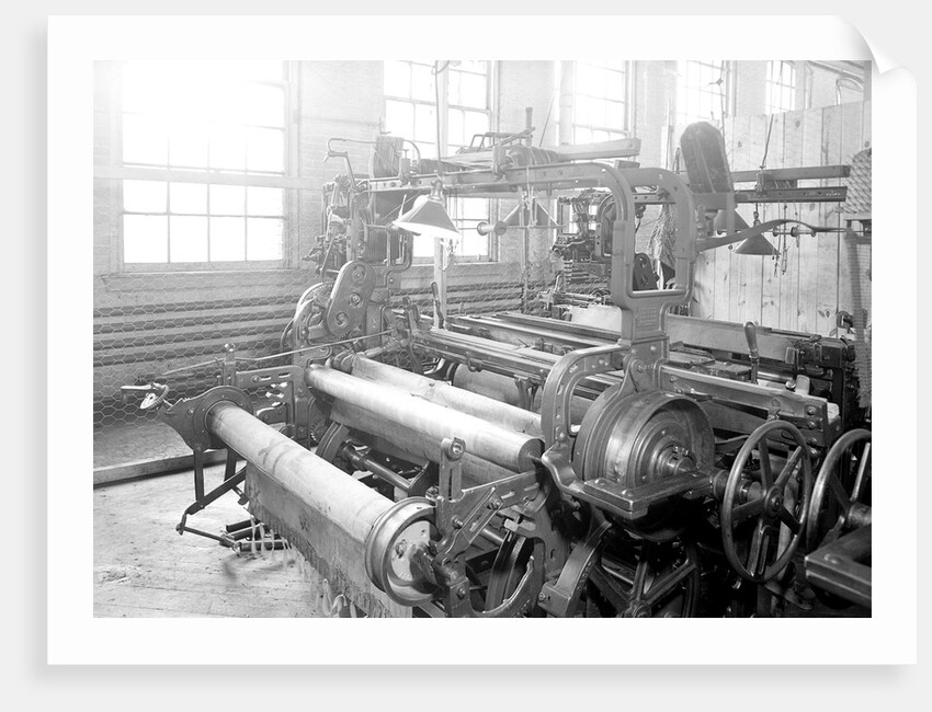 Paterson, New Jersey - Textiles. Idle quilling machines and looms in a cockroach shop. Note partition on the right and chicken-wire in the front, March 1937 by Lewis Hine
