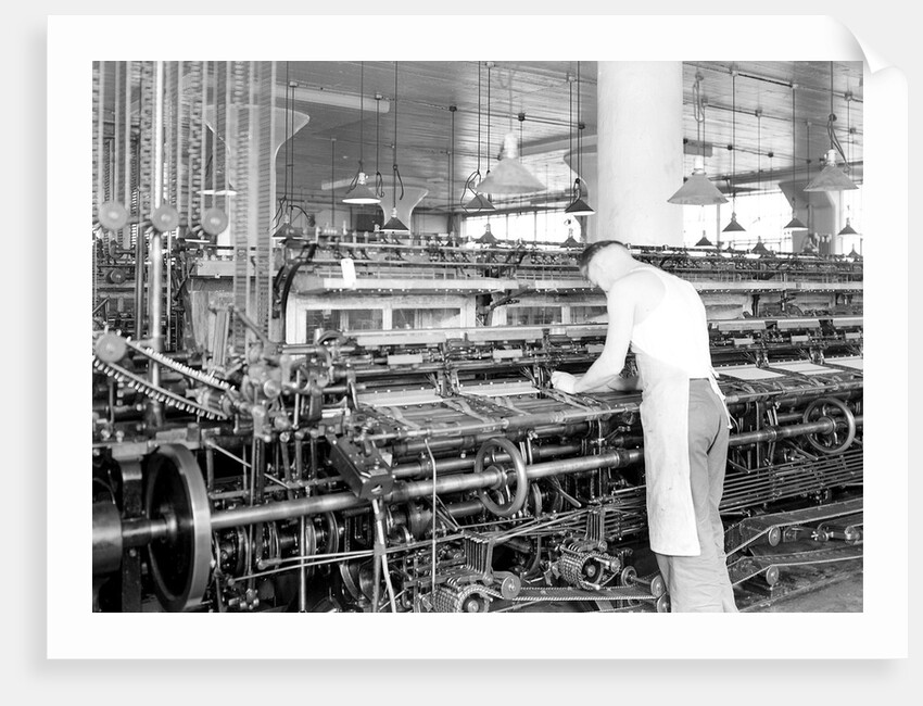 Philadelphia, Pennsylvania - Hosiery. Minnesac Mills. Man working over long row of machines, 1936 by Lewis Hine