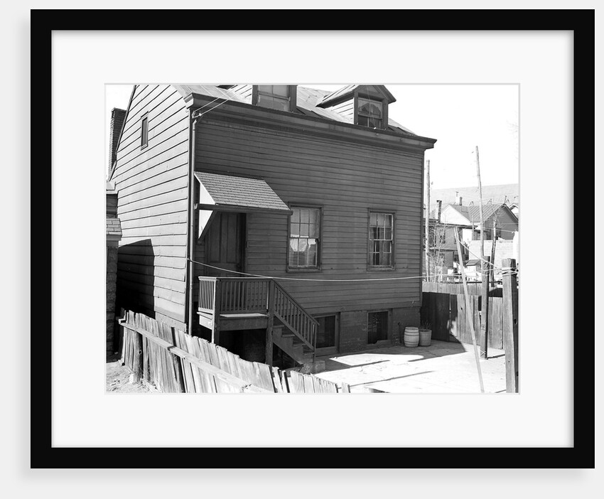 Paterson, New Jersey - Textiles. Home of silk workers in rear (inner) court off Sealey St. (very poor interior), March 1937 by Lewis Hine