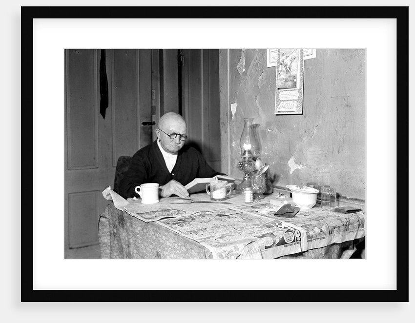 Paterson, New Jersey - Textiles. Living room and 78 year-old silk worker (now retired on $18 a month pension). Lives over Cafe, March 1937 by Lewis Hine