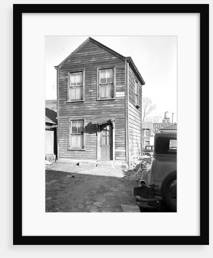 Paterson, New Jersey - Textiles. Two-room home, (kitchen below, bedroom above) of an old retired silk-worker by Lewis Hine