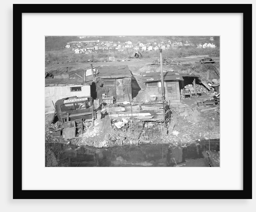 Paterson, New Jersey - Textiles. Bachelor shacks in outskirts of Paterson, on Molly Jan Brook by Lewis Hine