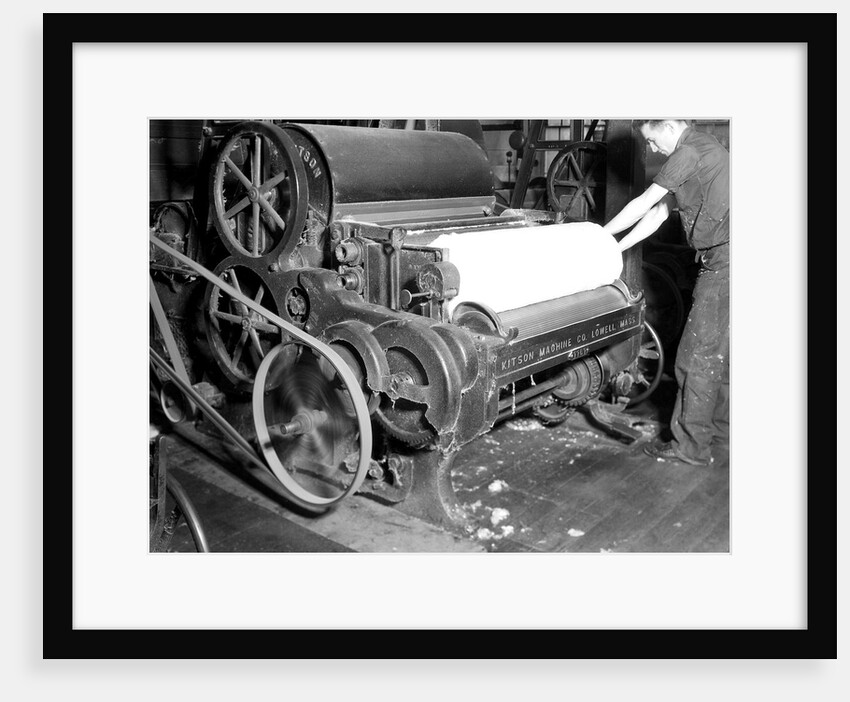 Millville, New Jersey - Textiles. Millville Manufacturing Co. Man rolling fabric, 1936 by Lewis Hine