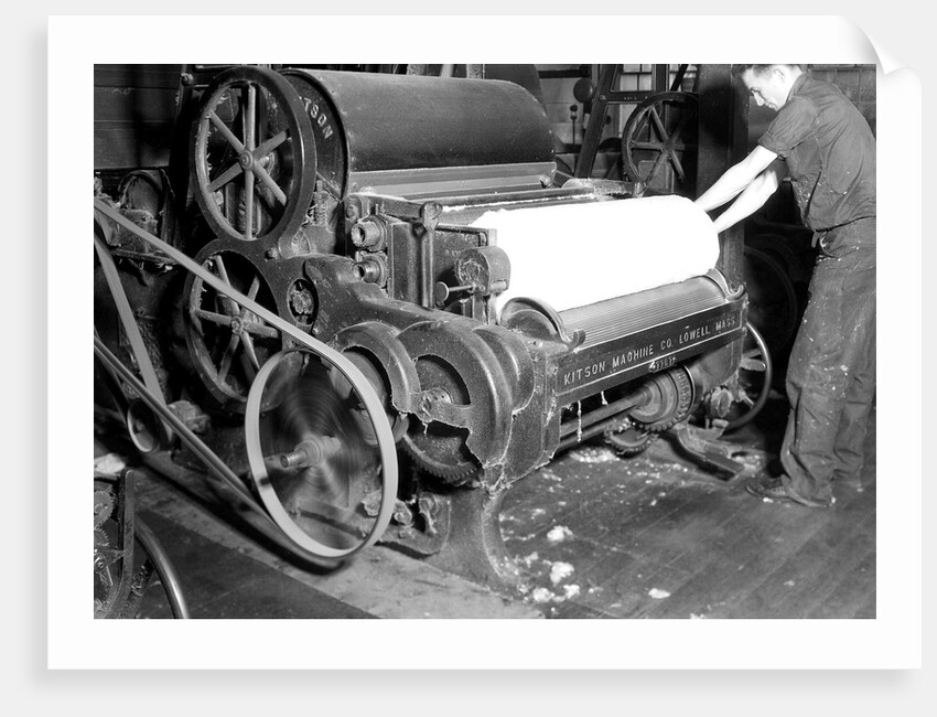 Millville, New Jersey - Textiles. Millville Manufacturing Co. Man rolling fabric, 1936 by Lewis Hine