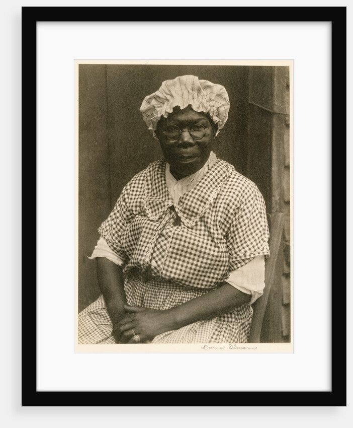Black Woman in Cap and Gingham Dress by Doris Ulmann