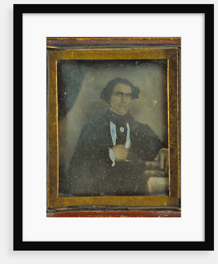Portrait of a man posed with books by Anonymous