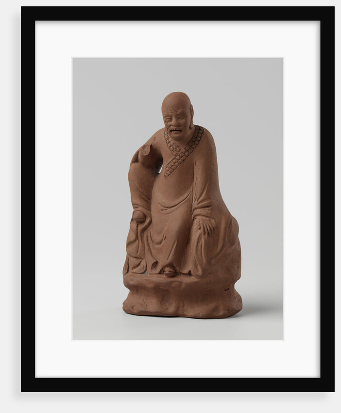 Man figure with raised right leg on rocky pedestal. Red stoneware. by Anonymous