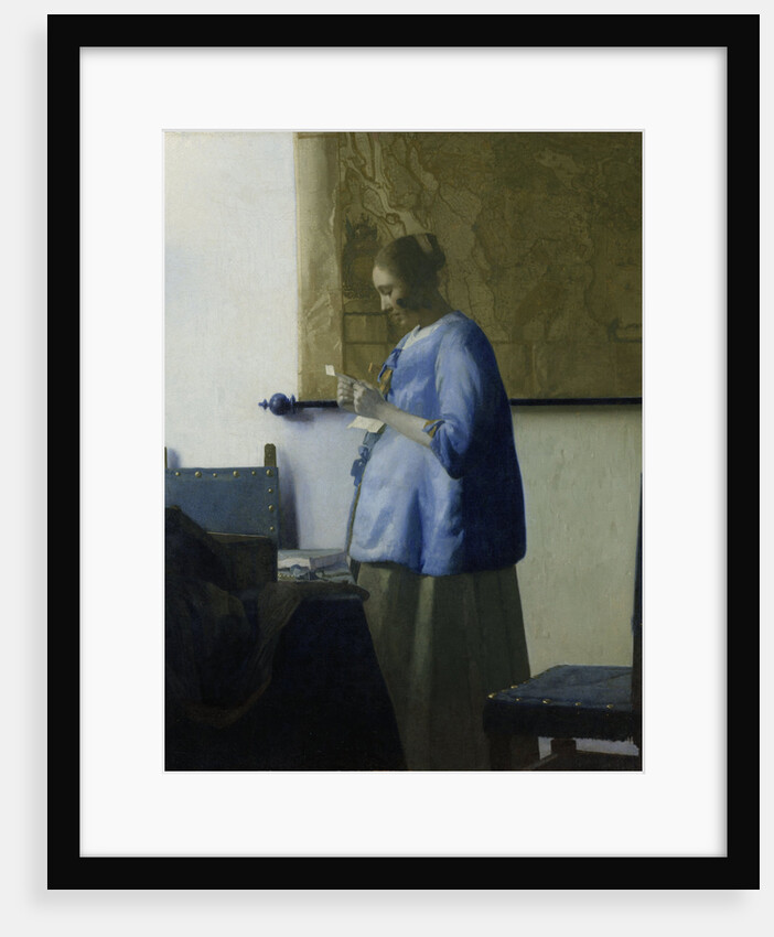 Woman Reading a Letter by Johannes Vermeer