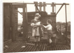 Marba (?) And Eckart Titzenthaler, children of the photographer, on the roof of the house Friedrichstrasse, Berlin, with a cock, Germany by Waldemar Titzenthaler