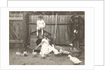 Marba and Eckart Titzenthaler, children of the photographer, standing on a farm with chickens and geese by Waldemar Titzenthaler