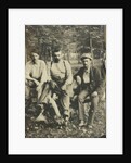 Portrait of three men sitting on a tree stump? In a forest by Anonymous