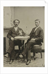 Portrait of two men sitting at the table in a studio, with a bottle and a glass, an imitation salon decor by Anonymous