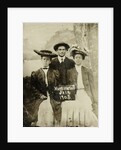 Portrait of a man and two women in front of a painted backdrop (tree, lake and mountains) and a sign that read 'Huntington FAIR 1905 by Anonymous
