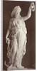 Marble statue of a woman in a robe with a bare chest, in her left hand she wears a laurel wreath in her right a ship's anchor by Louis-Emile Durandelle