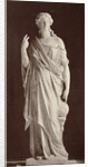 Marble statue of a woman in high-necked dress, with her right hand pointing at a globe and her left hand pointing in the air by Louis-Emile Durandelle